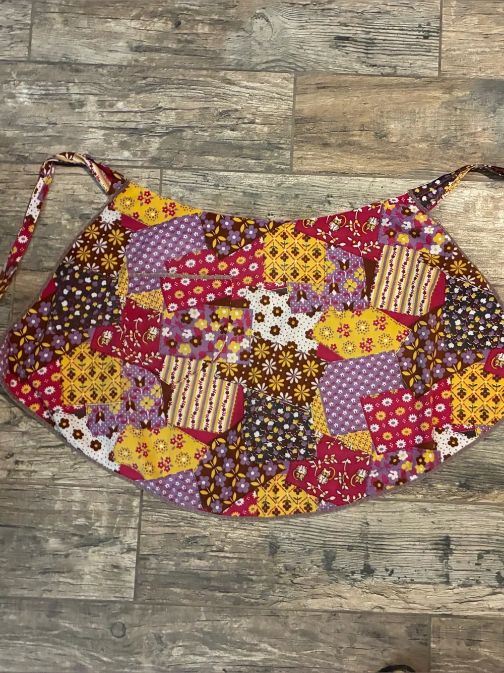 The handmade patchwork purple pink apron